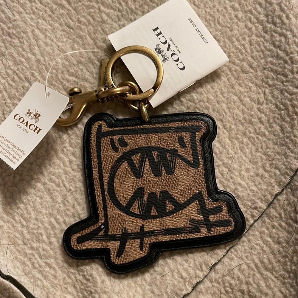 Coach Guang Yu keychain